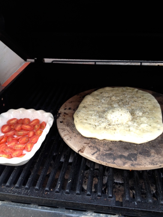 grilling flatbread and tomatoes